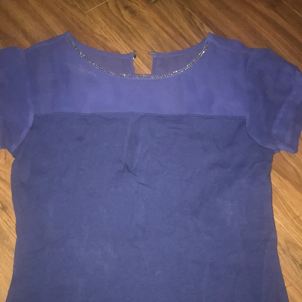 Royal blue top with silver studs around neckline